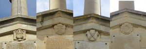 Escudos del Monumento a los Caídos: Águila de San Juan; Yugo y flechas de la Falange; Cruz de Borgoña Carlista; Escudo municipal